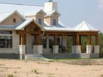 One of a Kind Ranch House with Steel Roof & Wrap-Around Porch