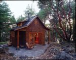 Peer into this 400-square-foot cabin's sunny kitchen ...