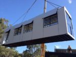 Cross-Stacked Cantilevered Shipping Container House