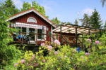 Relax in a Wooden Cottage House with a Beautiful Garden