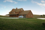 Great Barn Home Features an Open Wrap Around Porch