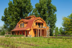 Elegant Barn Homes with Covered Porch and Upper Deck