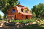 Elegant Barn Homes with Covered Porch and Upper Deck