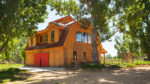 Elegant Barn Homes with Covered Porch and Upper Deck