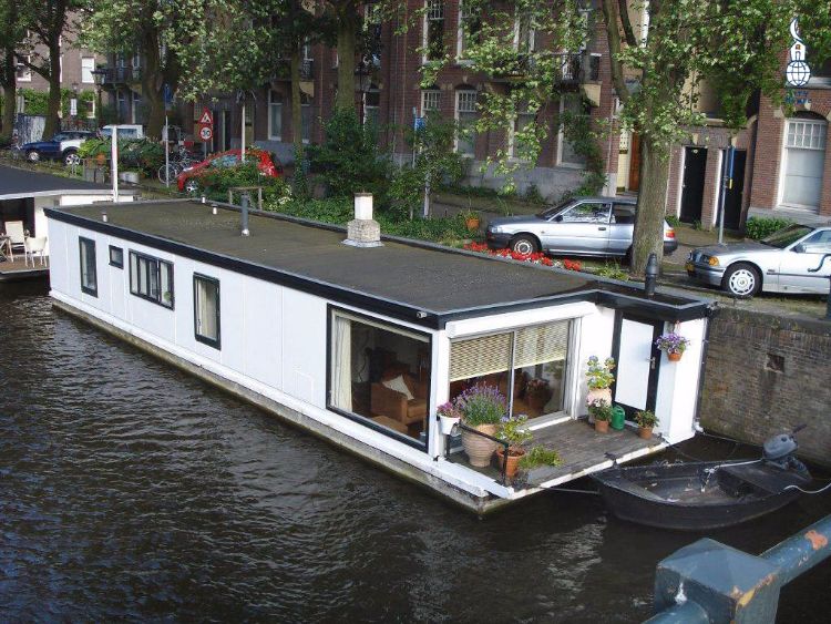 Feel at Home with this unique floating home's charming living room