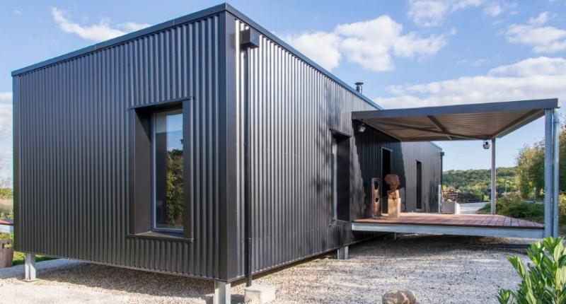 Container Home - this One has a Porch and Modern Interior Design